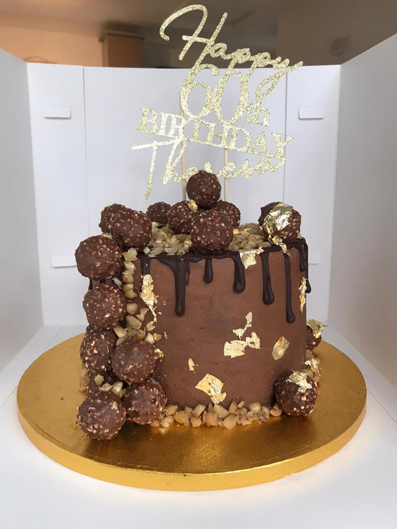 Birthday Cake Chocolate
 Ganache covered chocolate drip Ferrero Rocher cake